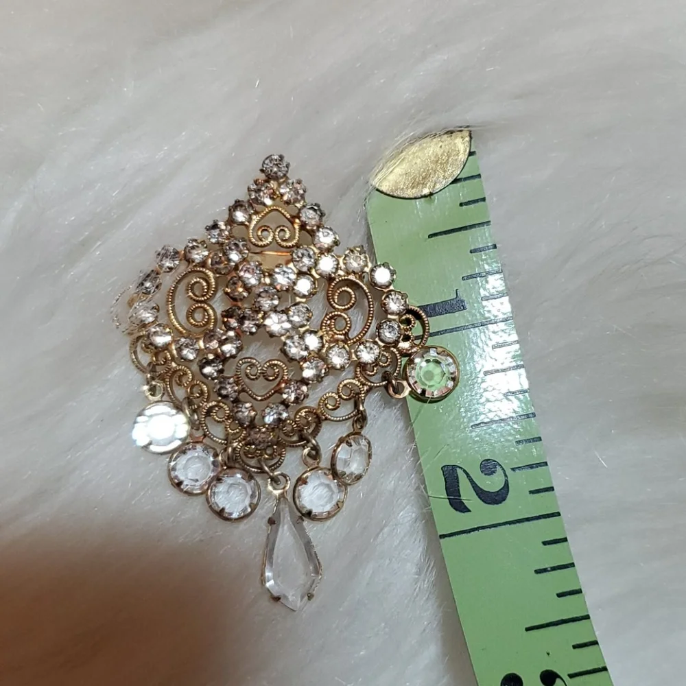 Vintage gold tone pin brooch